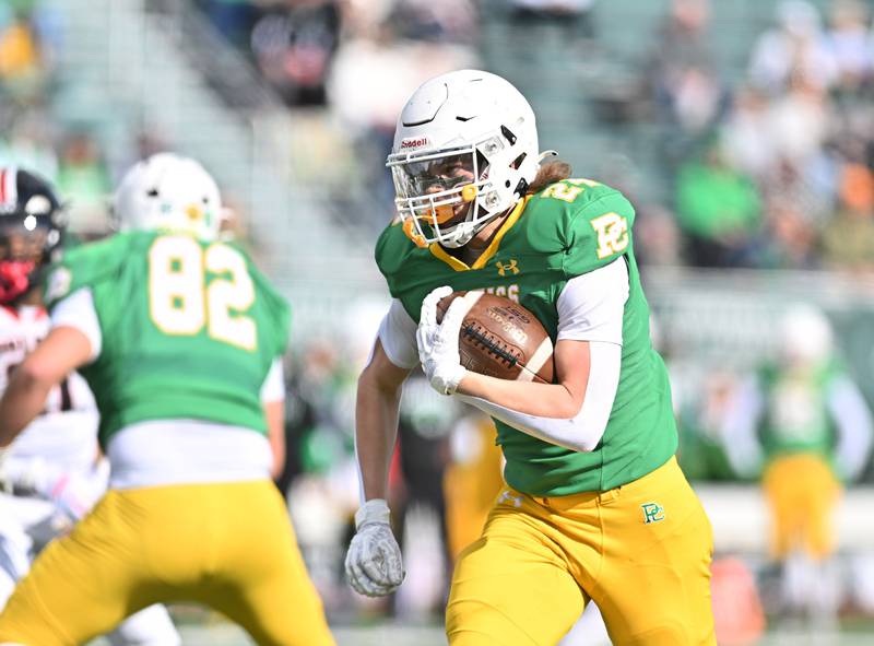 Providence Catholic's Broden Mackert (24) rushes for a big gain during the class 5A first round playoff game against Springfield on Saturday, NOV. 01, 2025, at New Lenox.
