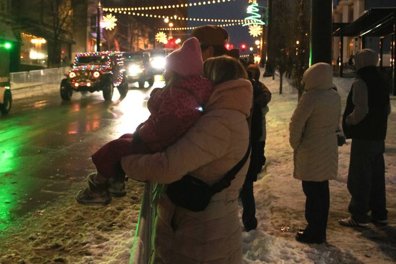 The Wulff  family, of Bourbonnais, watches the Kankakee Christmas Parade on Saturday, Dec. 13, 2025.