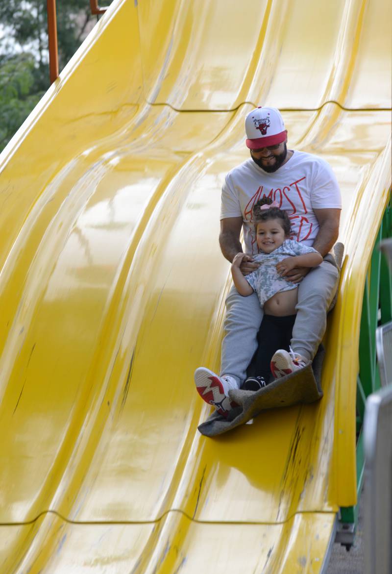 Nick and Ellie Brown of Lyons enjoy the slides while attending  the LaGrange Endless SummerFest Sunday Aug 6, 2023.