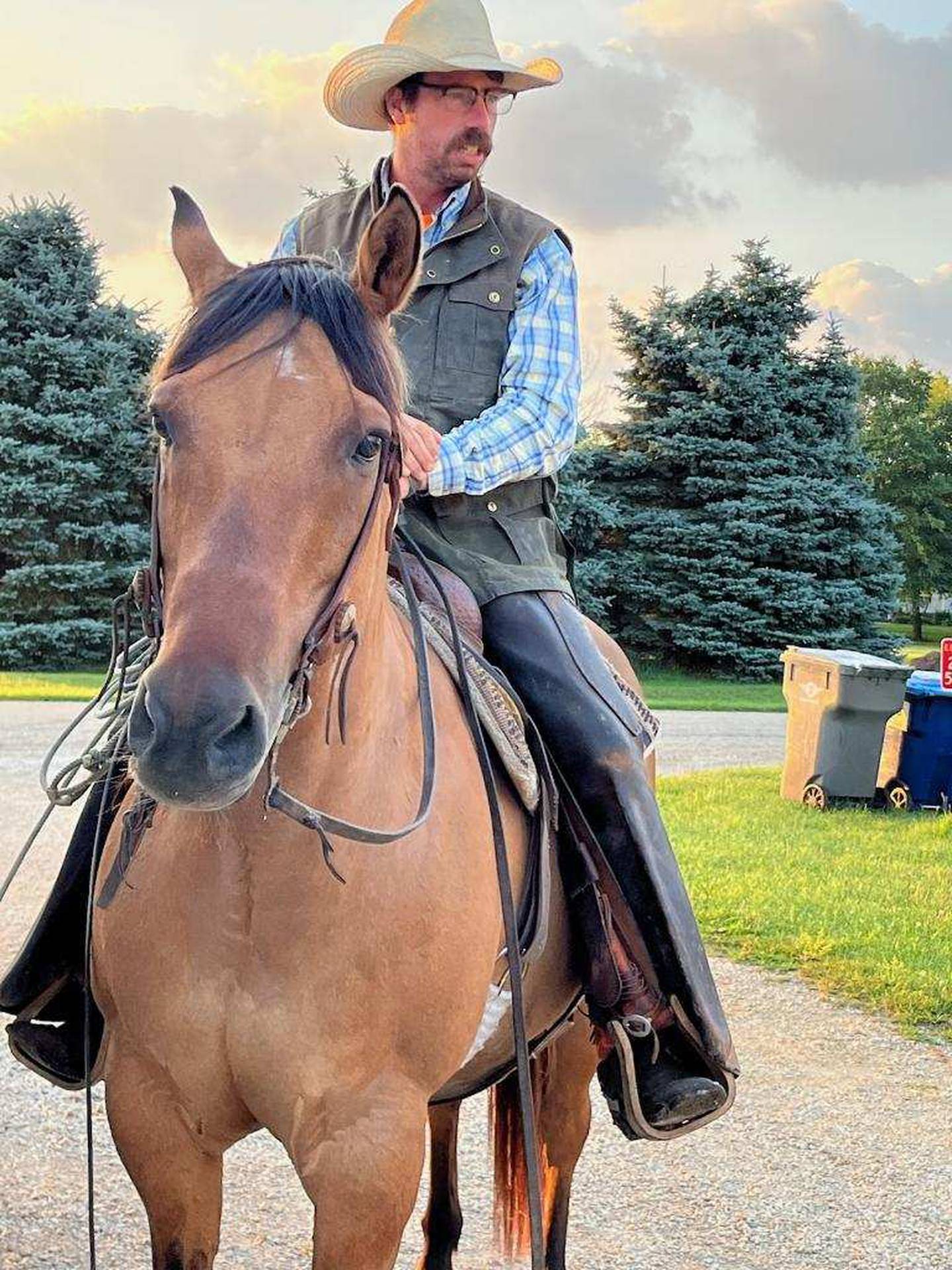 Westley Bush rides amount at the Diehl Farm in Maple Park, during the search for missing calves from the Burgin Farm nearby on Friday morning, July 7, 2023.