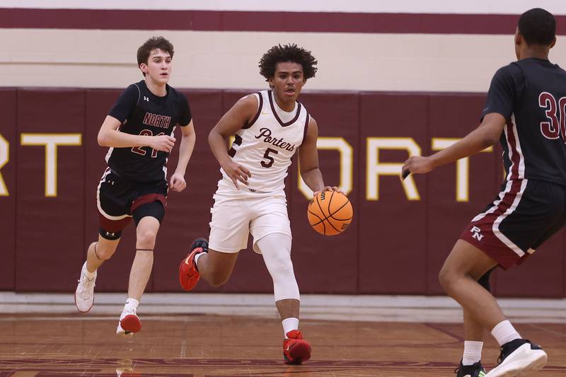 Lockport’s Nathan Munson works the ball upcourt against Plainfield North on Friday, Jan. 3, 2025 in Lockport