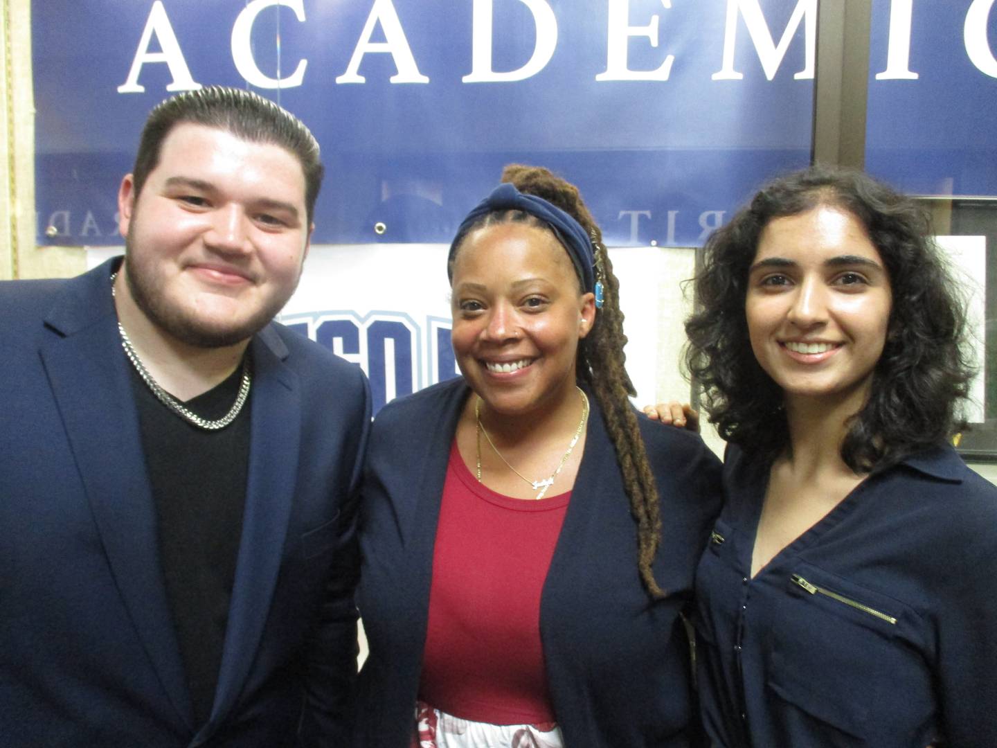 Oswego School District 308 Director of Diversity, Equity and Inclusion Jadon Waller, center, is shown here with high school student ambassadors Colton Sannito, left, and Aanya Roy. (Mark Foster -- mfoster@shawmedia.com)