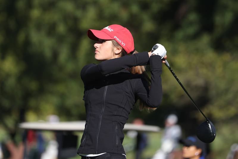 Hinsdale Central’s Lilly Riegger tees off at the Hinsdale South Girls Class 2A Golf Sectional at Village Greens of Woodridge. Monday, Oct. 3, 2022, in Darien.