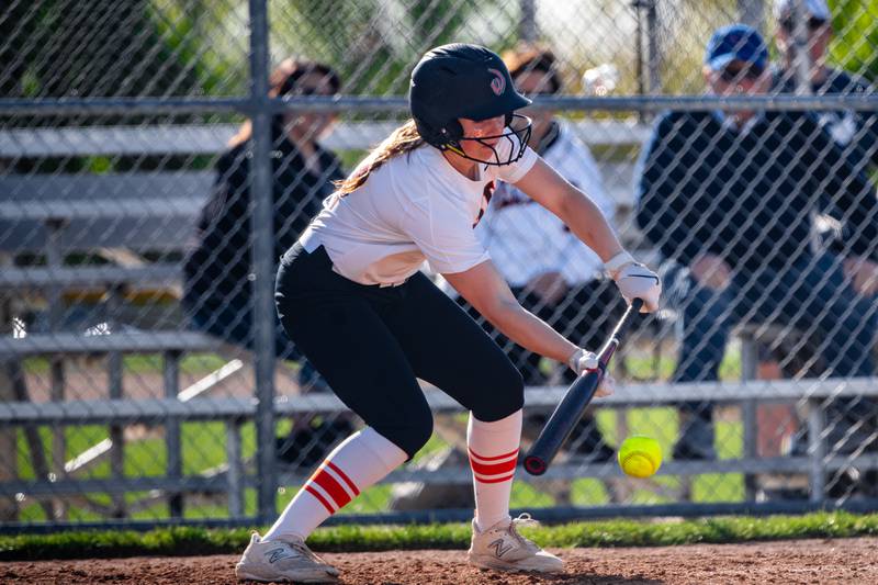 Lincoln-Way West's Jess Noga bunts during a game against Plainfield Central on Friday May 3, 2024 at Lincoln-Way West in New Lenox