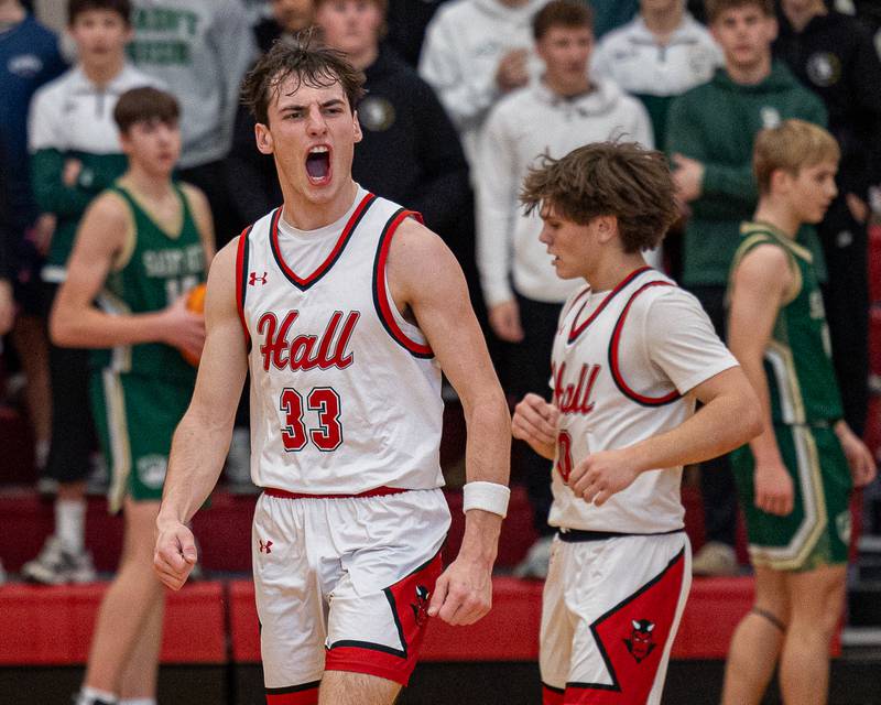 Braden Curran (33) of Hall reacts after scoring 1,000th career point in game against St. Bede on Saturday, January 31, 2026 at Hall High School in Spring Valley.