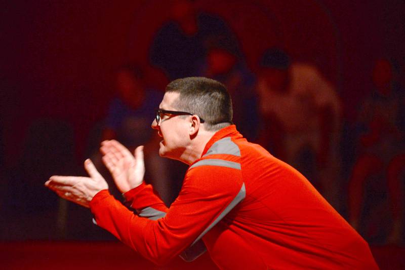 Hawk coach Justin Lahman cheers on one of his wrestlers during the 1A team sectional on Tuesday, Feb. 25. 2025. The Hawks edged Sterling Newman 39-30 to advance to the final four, state finals in Bloomington this weekend.