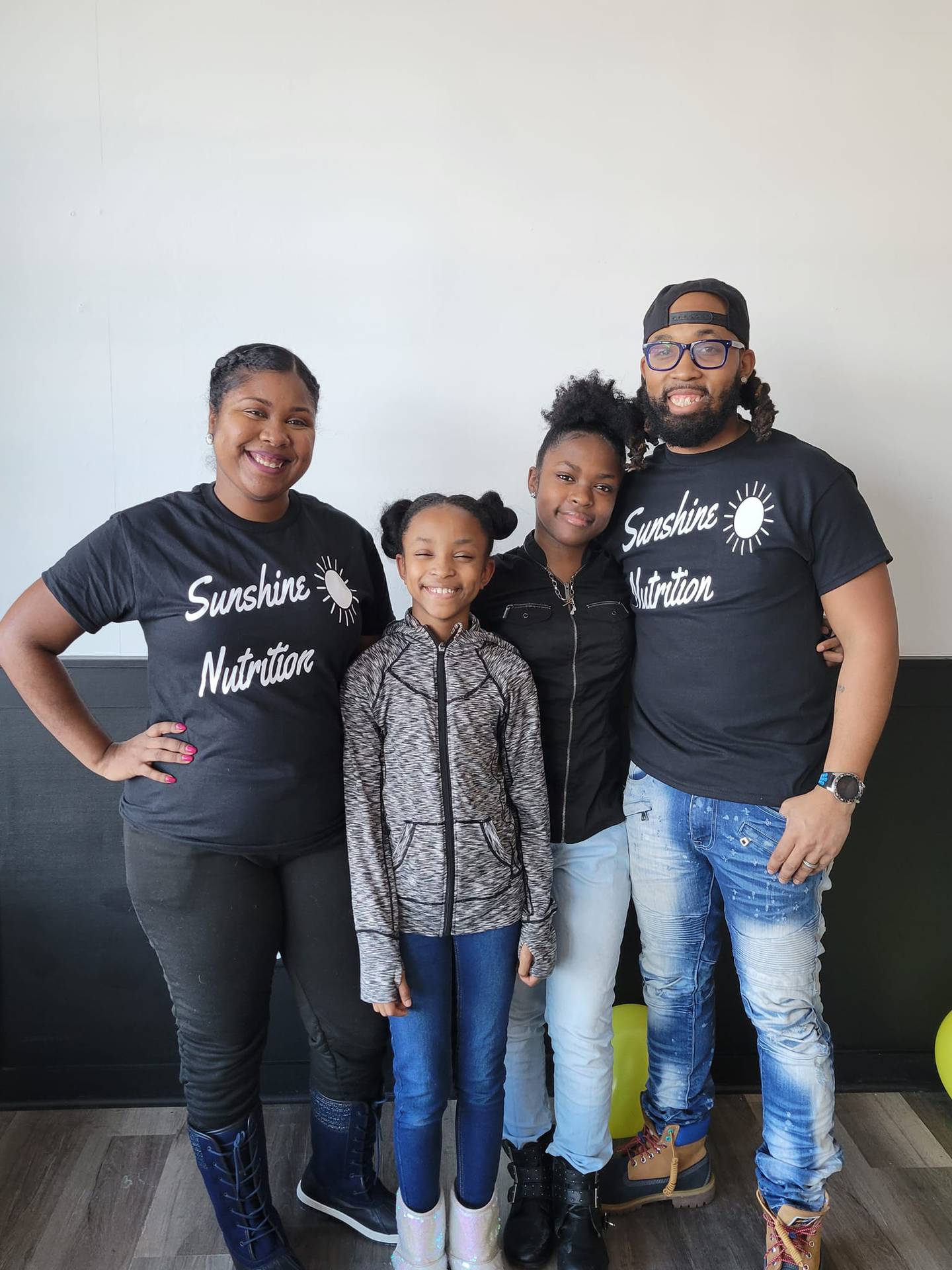 Pictured are the owners of Sunshine Nutrition in New Lenox, Lucky Collins (left) and Terry Collins (right) and their children Harmony Collins (left) and Serenity Collins (right).