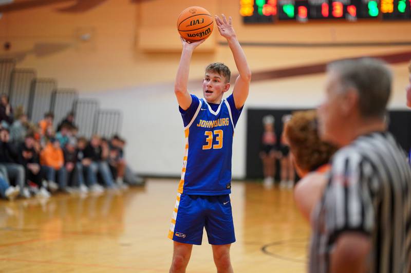 Johnsburg's JT Schmitt (33) shoots a free-throw late in the 4th quarter of play against Sandwich during a basketball game at Sandwich High School on Friday, January 31, 2025.