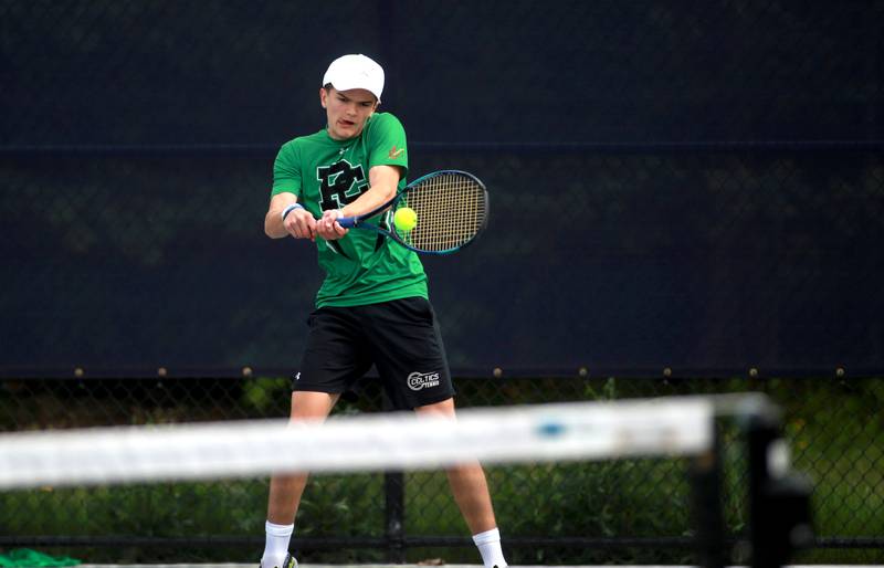 Providence Catholic’s Jesse Tyler returns the ball during the first round of the 1A boys state tennis meet on Thursday, May 29. 2025 at Buffalo Grove High School.