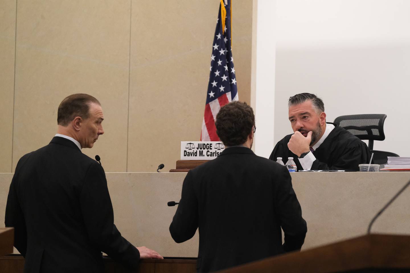 Judge David Carlson speaks with attorneys Chuck Bretz and Thomas Bahar before closing arguments in the Jeremy Boshears murder trial. Boshears is charged with the murder of Kaitlyn “Katie” Kearns, 24, on Nov. 13, 2017. Friday, April 29, 2022, in Joliet.