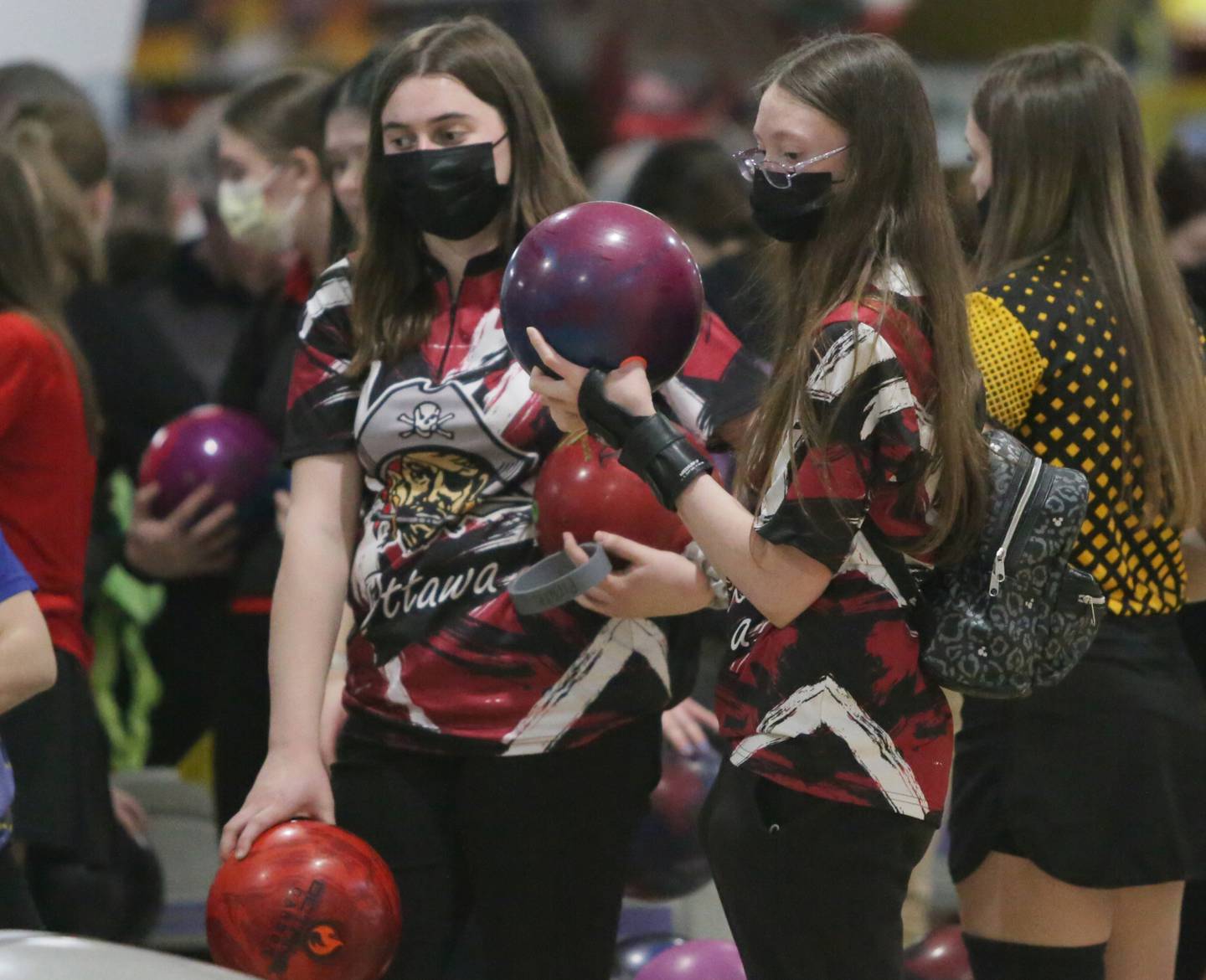 Ottawa's Makenzie Lewis and Laura Pool chat between sectional games at Illinois Valley Super Bowl on Saturday, Feb. 12, 2022 in Peru.