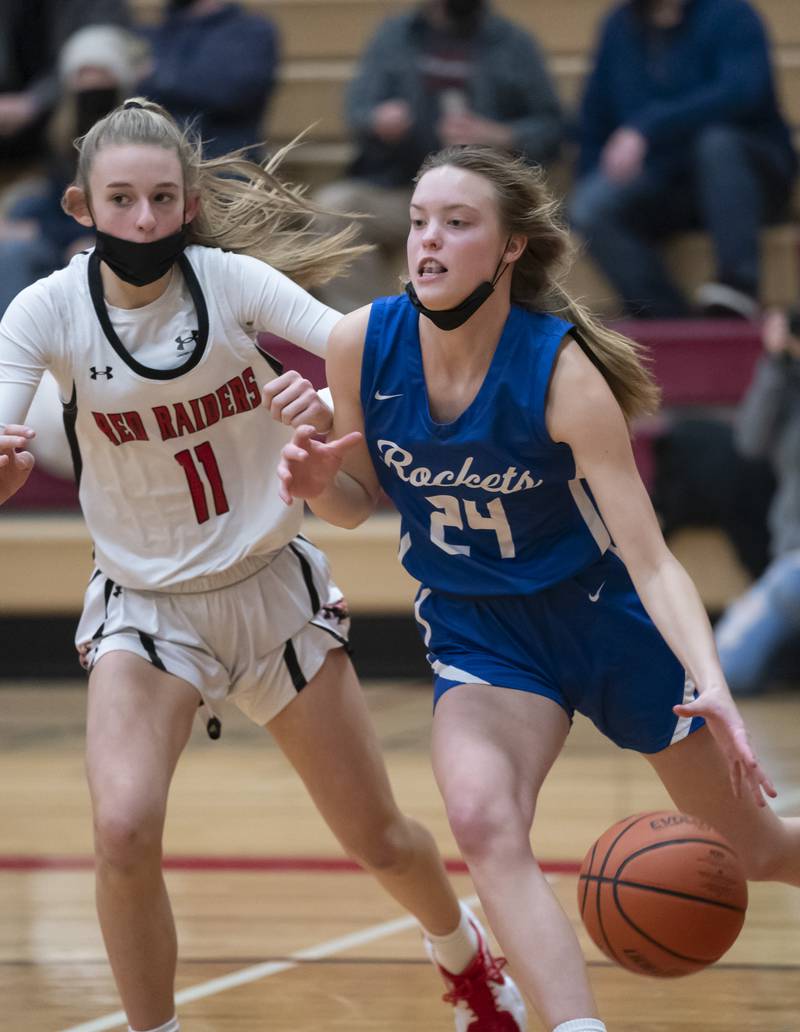 Burlington Central's Page Erickson gets past Huntley defender Anna Campanelli during their game on Saturday, January 29, 2022 at Huntley High School. Huntley won 52-49.