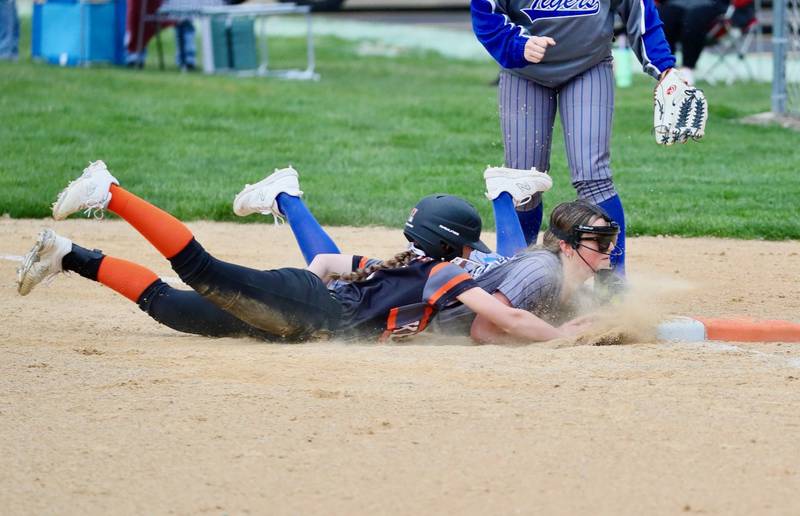 Princeton second baseman Sylvie Rutledge doubles off Kewanee's Abby Gerard off first base after catching a line drive in the second inning in Thursday's game at Little Siberia. Kewanee won the game 6-2.