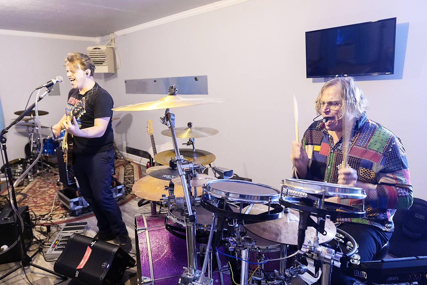 Timothy Morris (left) and dad Steve Morris rehearse Thursday, Jan. 9, 2025, for an upcoming show at their Prophetstown home.