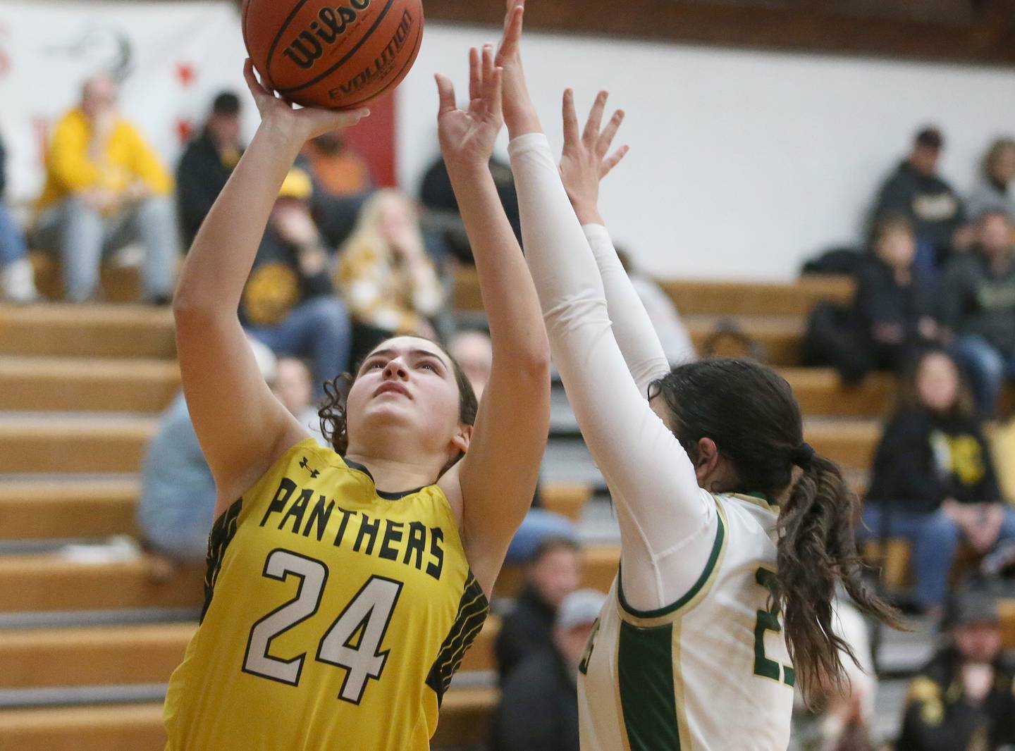 Putnam County's Maggie Richetta eyes the hoop as St. Bede's Ali Bosnich defends during the Tri-County Conference Tournament championship game on Thursday, Jan. 18, 2024 at Henry-Senachwine High School.