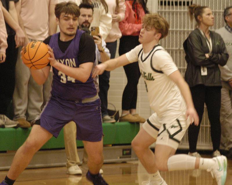 Dixons Jakob Nicklaus gets the ball around a Rock Falls defender. The Rock Falls Rockets hosted the Dixon Dukes in a Conference basketball game. The game was held at Forest Tabor gym in Rock Falls on Friday, February 13, 2026