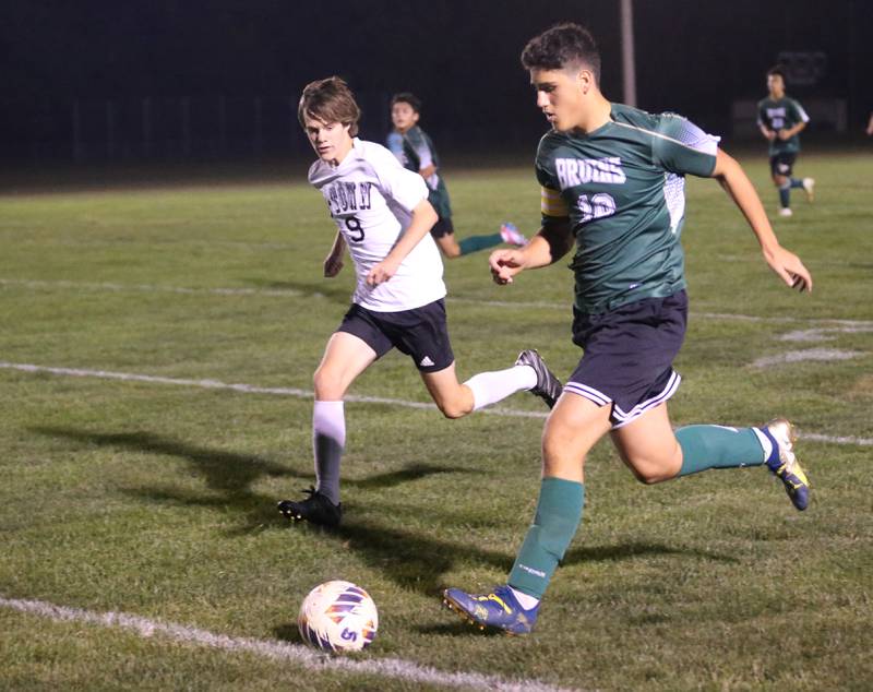 St. Bede's Alp Arslan kicks the ball past Abingdon-Avon's Brody Redfern on Wednesday, Oct. 15, 2025 at St. Bede Academy.