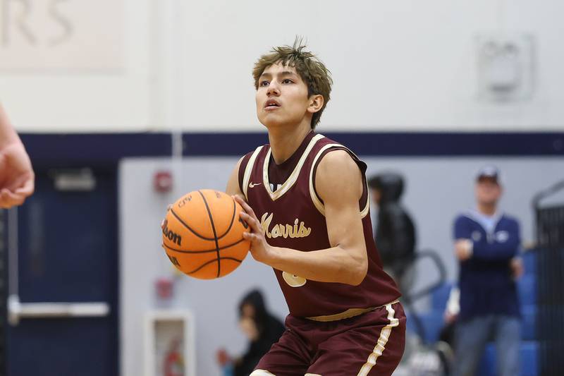 Morris’ Luis Loza lines up an outside shot against Plainfield South on Wednesday, Jan. 28, 2026 in Plainfield.