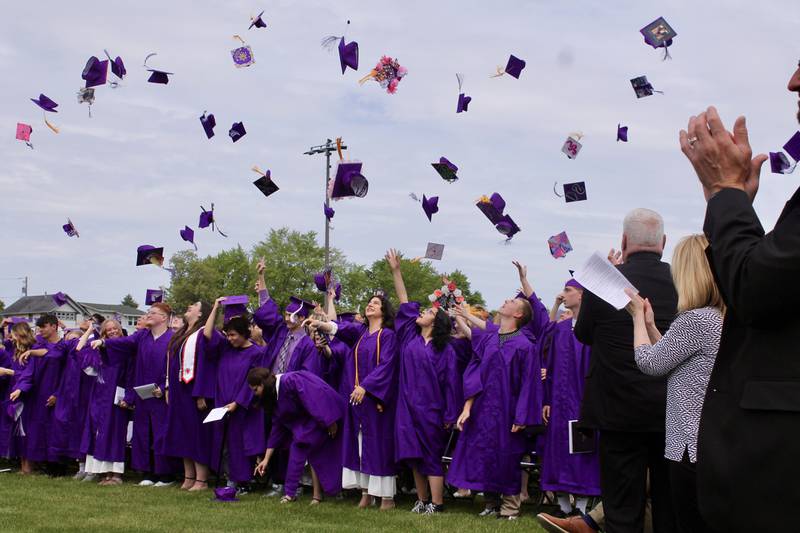 Caps part of the graduation attire are flung into the air on Sunday, May 28, 2023 as the Dixon High School Class of 2023 ceremony concludes.