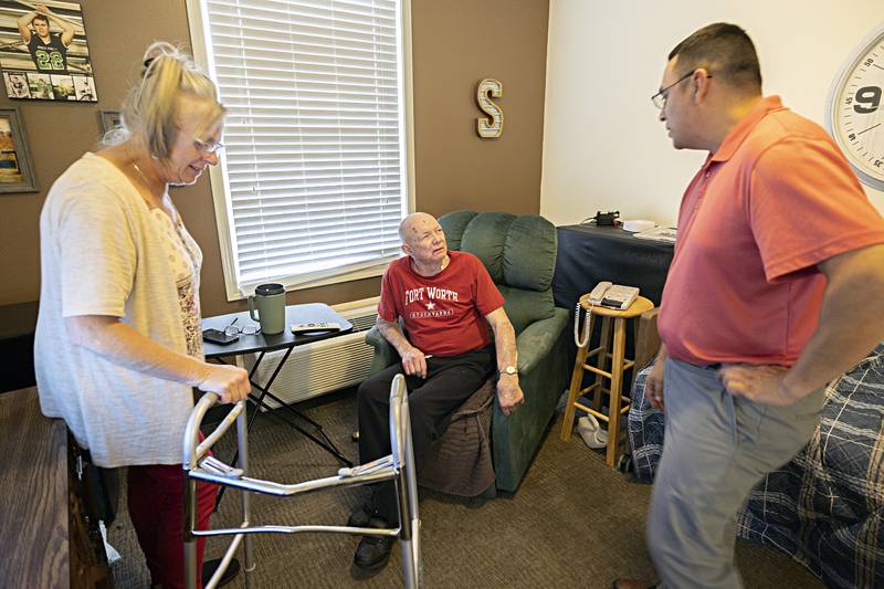 Arellano speaks with resident Ron Sandrock one on one Thursday, Nov. 16, 2023 at Liberty Court.