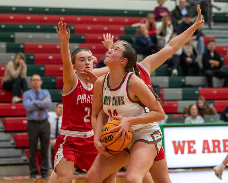 Drew Depenbrock (14) of LaSalle-Peru looks to go up for layup after retrieving rebound under rim on Wednesday, December 17, 2025 at Sellet Gymnasium in LaSalle.
