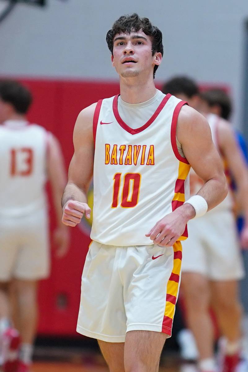 Batavia’s Joe Reid (10) looks up at the scoreboard after scoring a basket against Marmion during a basketball game at Batavia High School on Wednesday, Nov. 27, 2024.