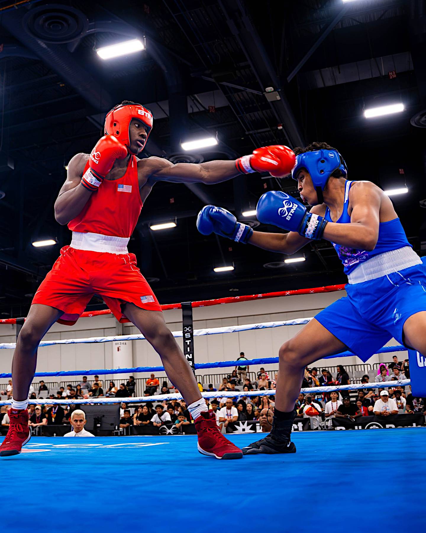 Joliet's JoJo Awinongya (left) throws a punch during his bout at the USA Boxing National Junior Olympics and Summer Festival in Las Vegas.