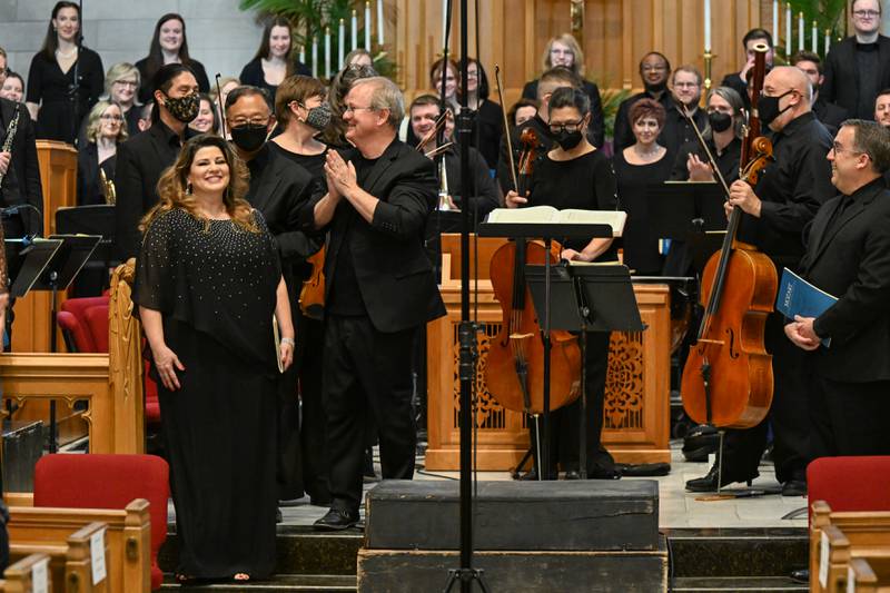 The St. Charles Singers in April 2022 in the penultimate "Mozart Journey" series concert. Guest soloist Michelle Areyzaga at left foreground.