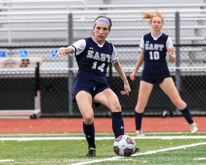 Oswego East's Taylor English (14) advances the ball during the Class 3A East Aurora Regional final between Oswego East vs. Oswego. May 20, 2022