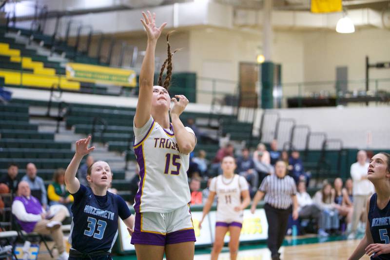 Downers Grove North's Adysen Fanta puts the jumper up against Nazareth during the Dave Yates Chicagoland Showcase on Saturday, Dec7,2024 at Fremd in Palatine.