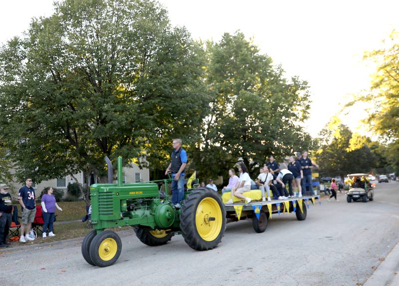 Kaneland High School Future Farmers of America ride in the  the school’s homecoming parade on Wednesday, Oct. 2, 2024 in Elburn.