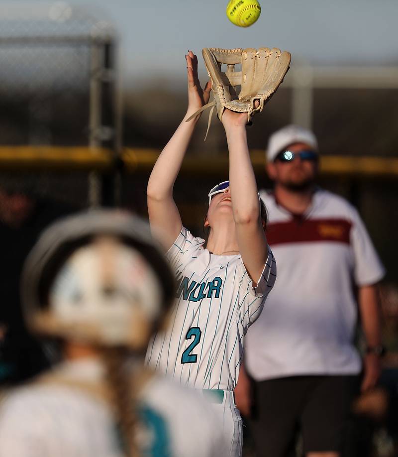 Woodstock North's Addy Crabill catches a popup to end a Kishwaukee River Conference softball game against Richmond-Burton on Thursday, April 16, 2026, at Woodstock North High School.