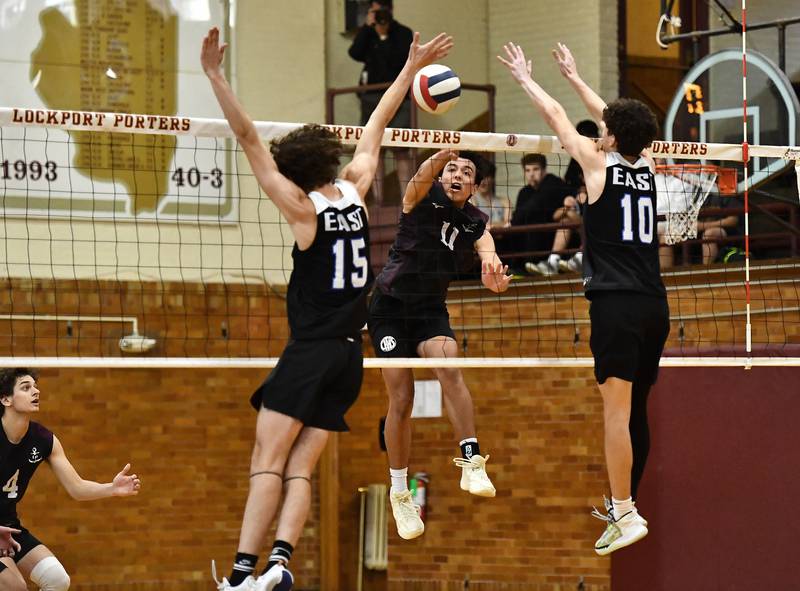 Lockport's Nathan Nacino hits a kill shot during the regional championship game against Lincoln-Way East on Thursday, May. 25, 2023, at Lockport.