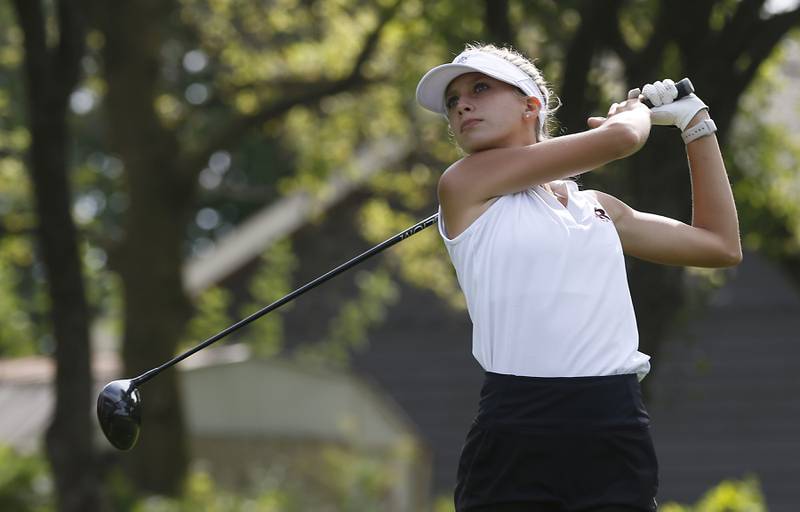 Prairie Ridge’s Jenna Albanese watches her tee shot on the ninth hole during the Fox Valley Conference Girls Golf Tournament Wednesday, Sept. 21, 2022, at Crystal Woods Golf Club in Woodstock.
