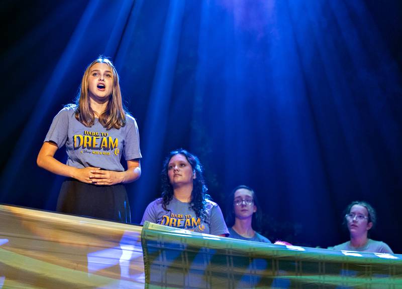 Rehearsing the song “How Far I’ll Go” from the movie Moana, members of the Dixon Young Actors group rehearse Friday, August 22, 2025, for their performance of “Dare to Dream Jr.” The musical showcases many of the most popular songs featured in Disney movies.