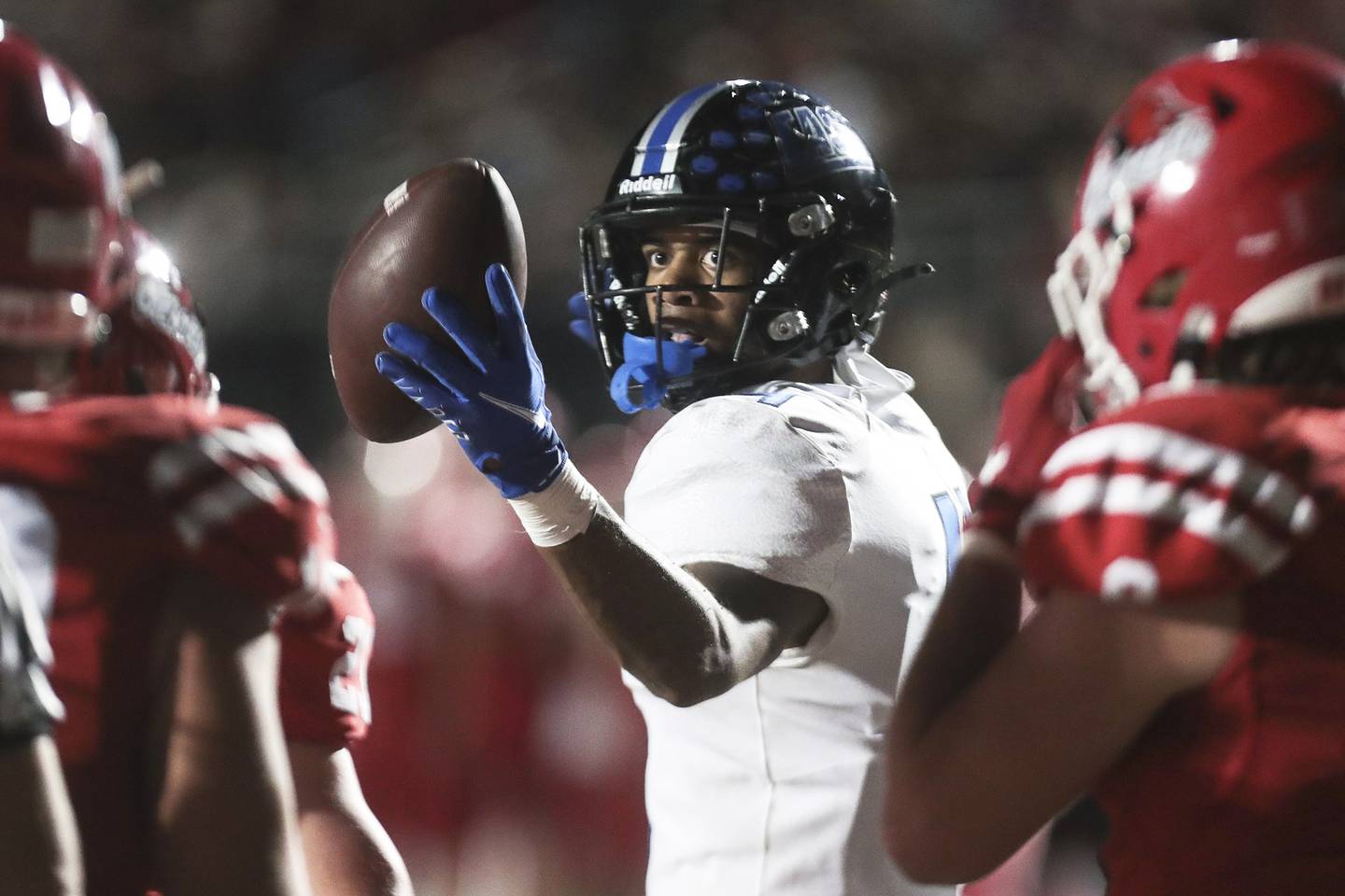 Lincoln-Way East receiver Trey Johnson celebrates scoring a touchdown on Friday, Sept. 3, 2021, at Naperville Central High School in Naperville, Ill.