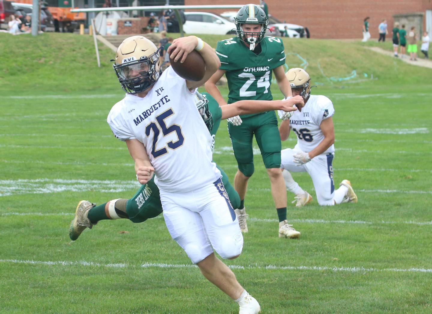 Marquette's Jaxsen Higgins runs into the end zone to score against St. Bede during the Homecoming game on Saturday, Sept. 28, 2024 at St. Bede Academy.