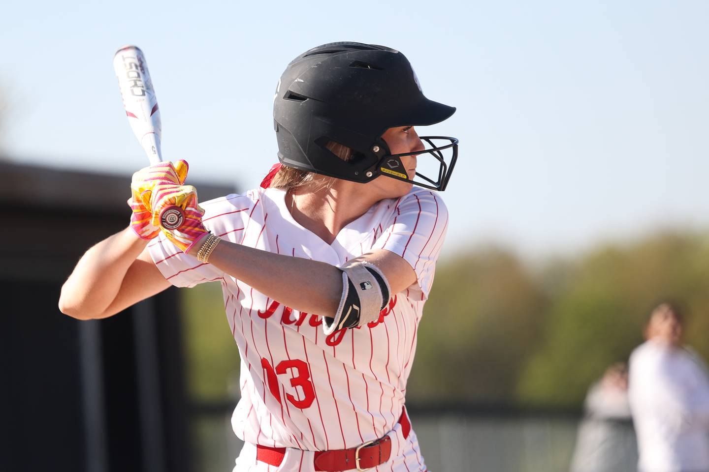 Lincoln-Way Central’s Lisabella Dimitrijevic locks in on a pitch against Lincoln-Way West on Thursday, April 24, 2024 in New Lenox.