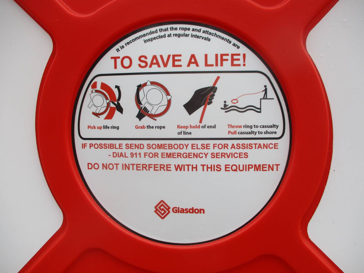 Instructions for getting and using the life saver are seen on a life saver box installed Wednesday along the Des Plaines River in Joliet. Feb. 26, 2025