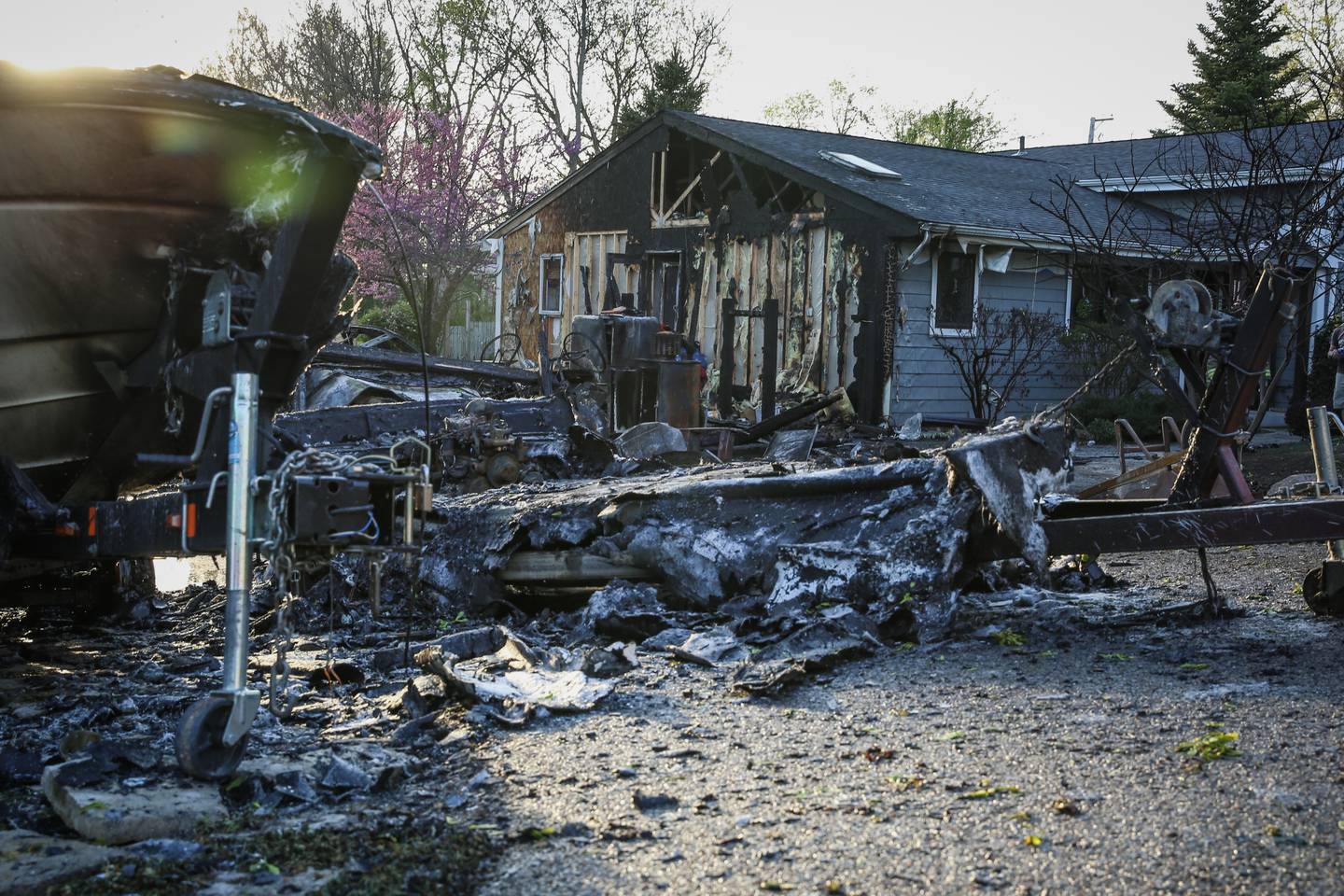 Wonder Lake garage fire spreads to two houses, leaving one