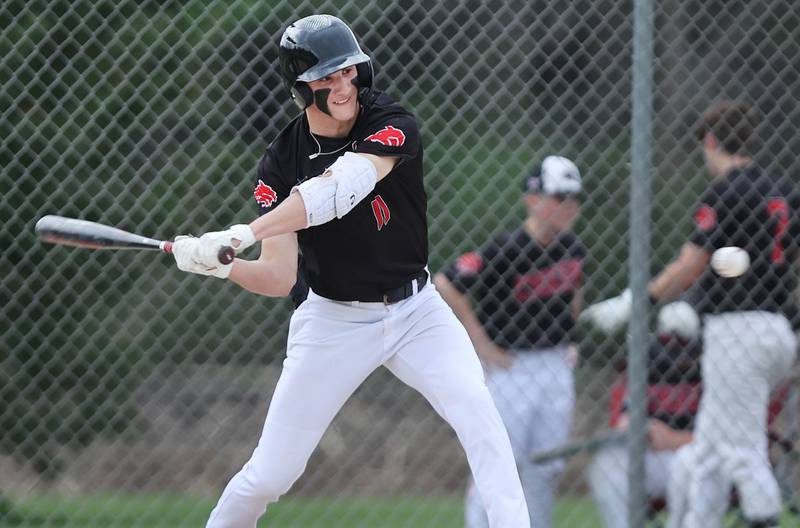 Indian Creek's Jeffrey Probst takes a cut during their game Thursday, April 20, 2023, against Hiawatha at Indian Creek High School in Shabbona. The game was stopped in the first inning due to weather.