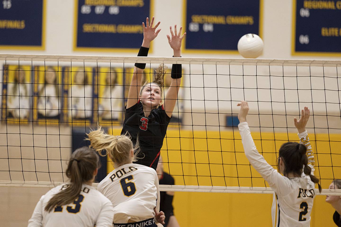 Fulton’s Annaka Hackett goes up for a block in game one of their semifinal regional match Wednesday, Oct. 26, 2022 against Polo.