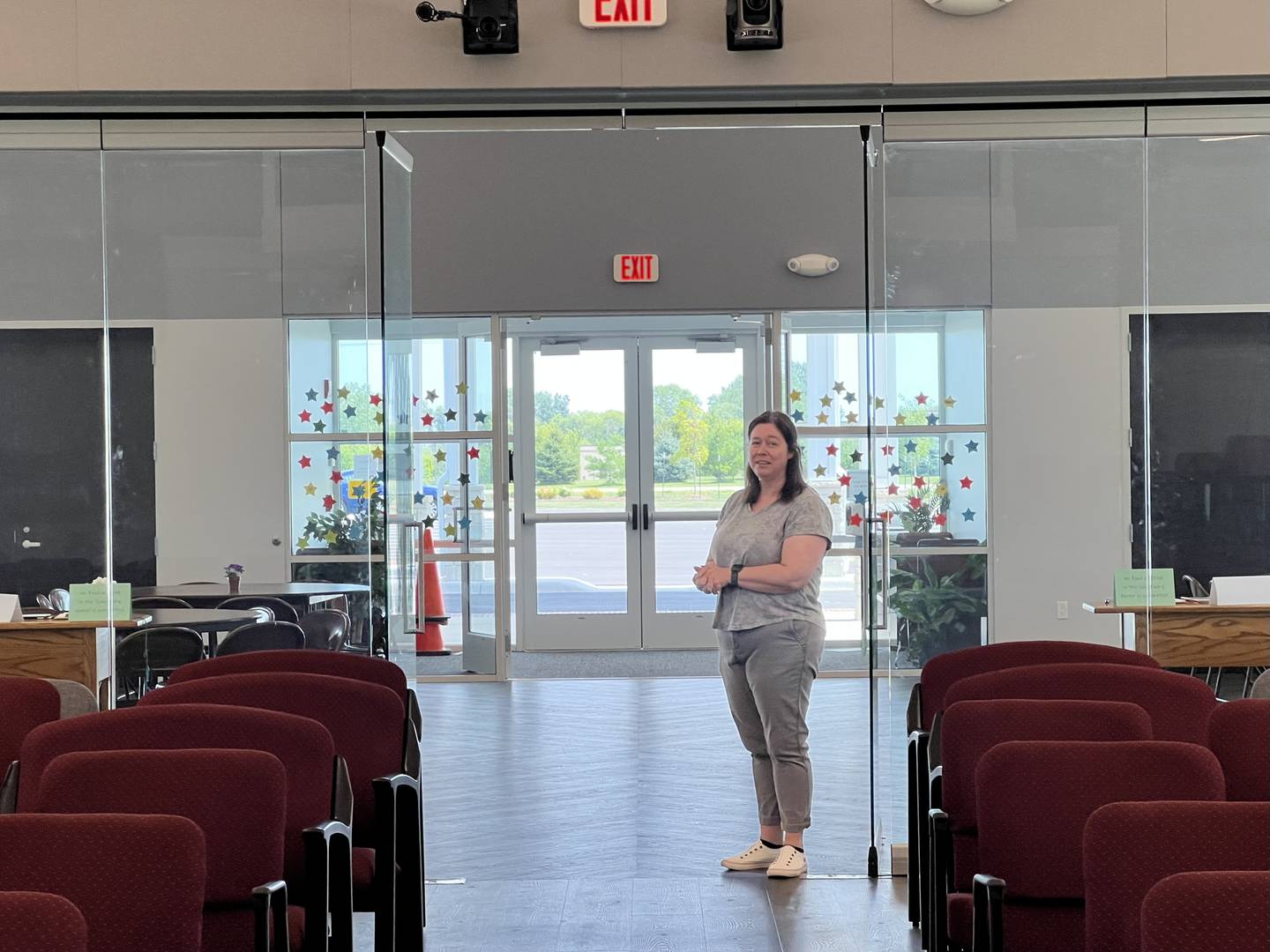 First United Methodist Church in DeKalb Administrator Jan Lam stands at the entrance of the church's brand new sanctuary on Aug. 4, 2023.