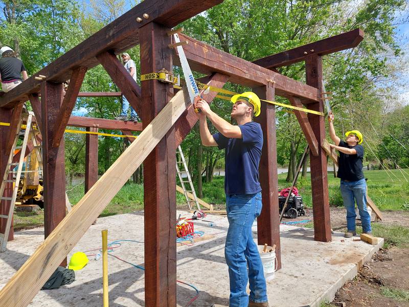 The Streator High School woodworking class constructs a shelter Friday, May 2, 2024, at the Hopalong Cassidy Canoe Launch in Streator.