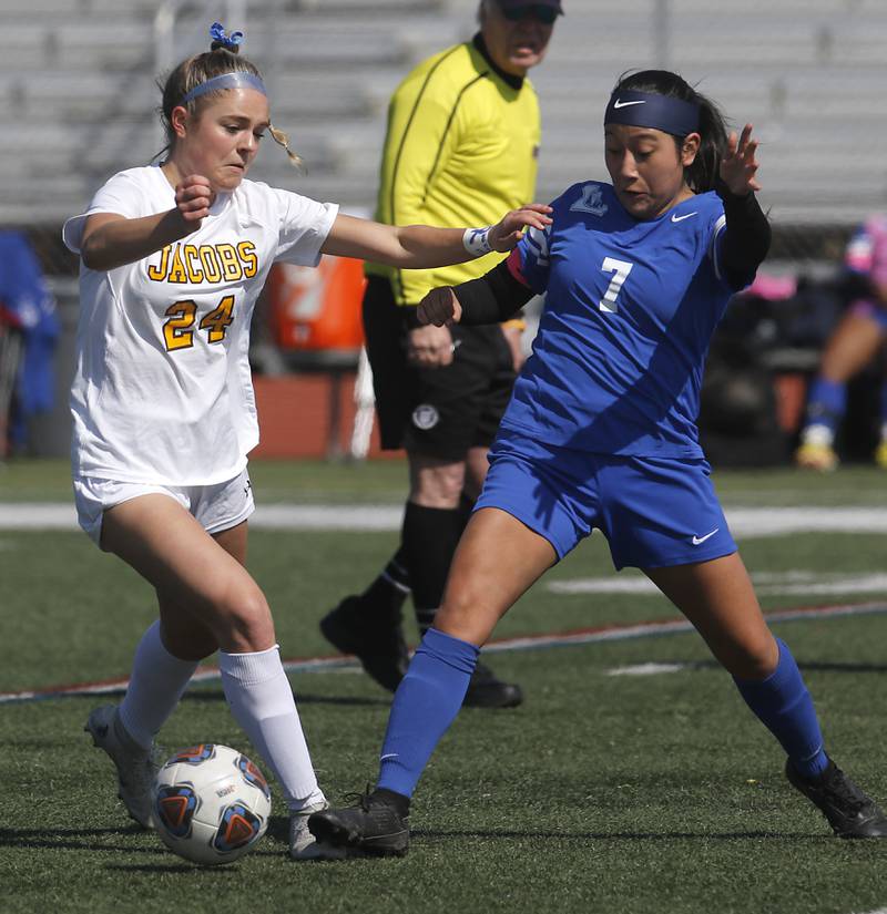 Jacobs' Bella Mickey battles with Larkin’s Mia Montesinos for control of the ball during a nonconference Huntley Invite girls soccer match Tuesday, March 28, 2023, at Huntley High School.