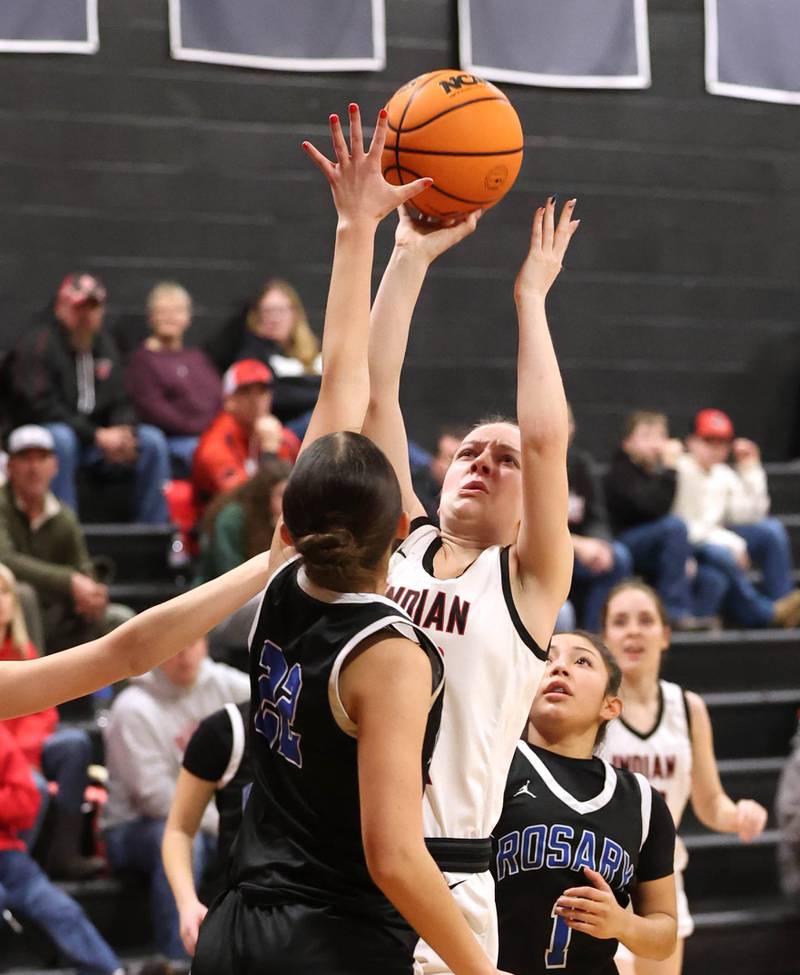 Indian Creek's Bethany Odle shoots over Rosary's Kayla Shimp Tuesday, Feb. 10, 2026, during their game at Indian Creek High School in Shabbona.