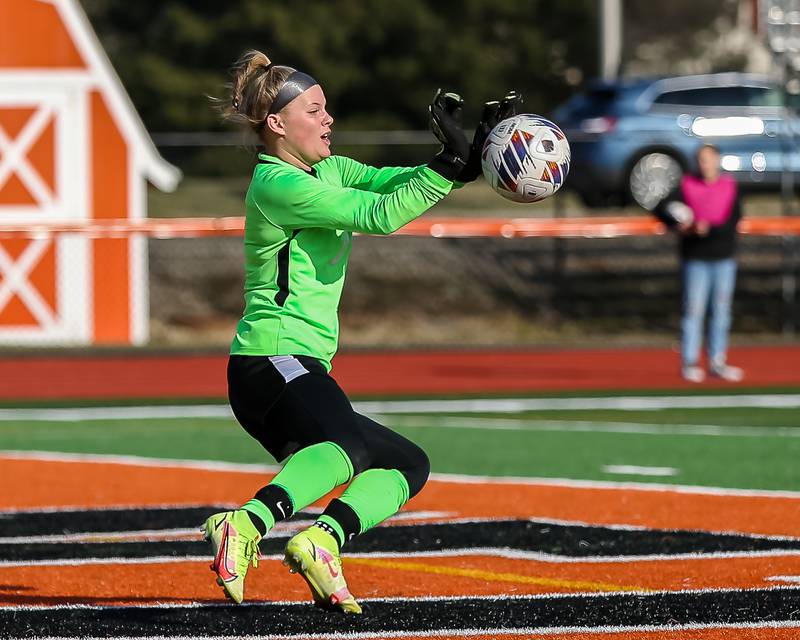 Burlington Central's Mackenzie Lorkowski (0) blocks a goal attempt during soccer match between Burlington Central at St. Charles East.  March 28, 2023.