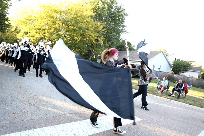 The Kaneland High School Marching Band performs on Wednesday, Oct. 2, 2024 during the school’s homecoming parade in Elburn.