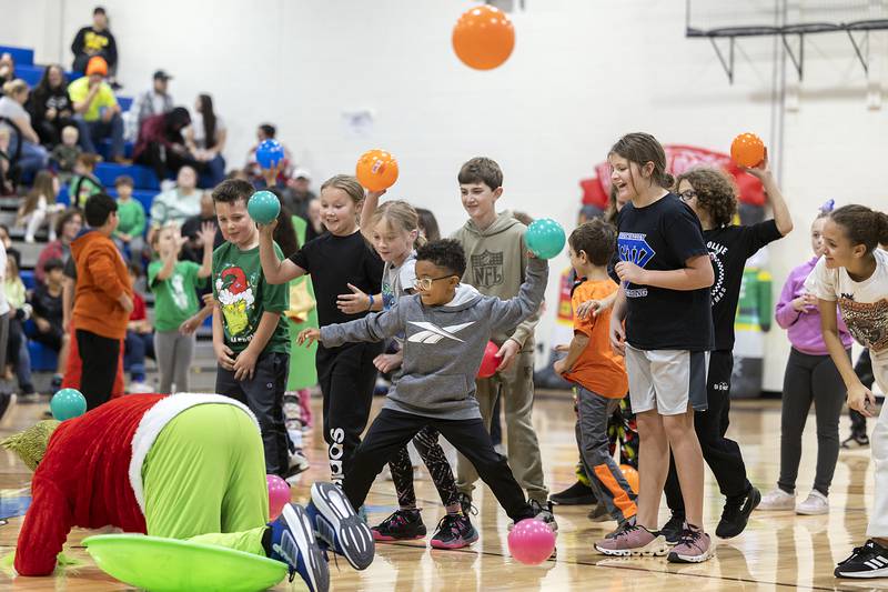 Kids fire on Grinch Saturday, Nov. 23, 2024, as part of the fun in Rock Falls. The annual Grinch dodgeball show down is a popular event as part of Rock Falls’ Hometown Holiday’s celebration.