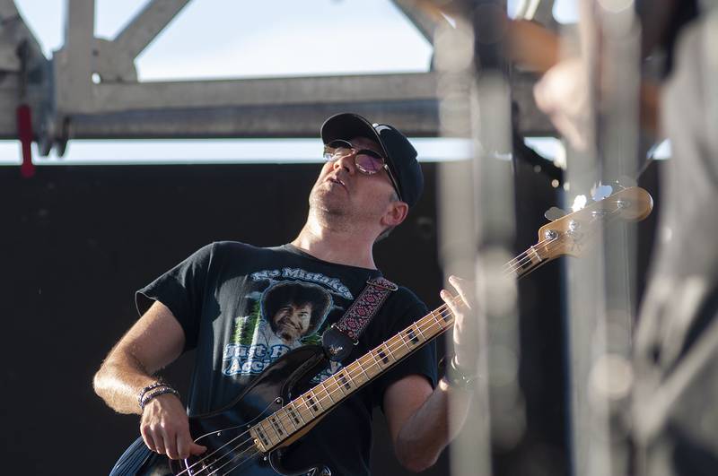The bassist for the "Sublime" tribute band "Secondhand Smoke" jams Saturday, July 2, 2022 on the G&M Stella main stage at Dixon’s Petunia Fest.